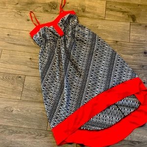 This dress is super cute. The back is longer than the front.